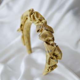 Marszczona opaska z jedwabnego krawata złota